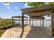 Lakeside boat dock featuring lifts and platforms for convenient water access at 5109 Vinson Dr, Tampa, FL 33610