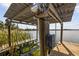 This shows a boat lift with a canopy, offering convenience for waterfront activities at 5109 Vinson Dr, Tampa, FL 33610
