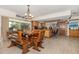 Open concept dining area connects to the kitchen, with access to the screened-in patio at 5109 Vinson Dr, Tampa, FL 33610