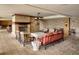 Charming outdoor lounge area with comfortable seating, fireplace, and brick accents at 521 Mandalay Ave # 307, Clearwater Beach, FL 33767