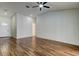 Bright and airy living area boasting wood-look flooring and ample natural light at 5435 Birchwood Rd, Spring Hill, FL 34608