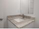 Bathroom vanity featuring a stone countertop and modern faucet at 5530 N 9Th St # 6, Tampa, FL 33604