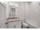 Bright bathroom with vanity, toilet, and shower-tub combo at 5530 N 9Th St # 6, Tampa, FL 33604