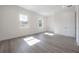 Bedroom featuring windows that allow lots of natural light and hard flooring at 5530 N 9Th St # 6, Tampa, FL 33604