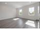 Bright bedroom featuring windows that allow natural light and hard flooring at 5530 N 9Th St # 6, Tampa, FL 33604