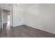 Bedroom with hard flooring, white walls, and a closet with bifold doors at 5530 N 9Th St # 6, Tampa, FL 33604
