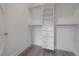 Walk-in closet featuring adjustable shelving and drawers for optimal storage at 5530 N 9Th St # 6, Tampa, FL 33604