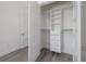 Walk-in closet equipped with shelving and drawers for optimal storage at 5530 N 9Th St # 6, Tampa, FL 33604