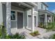 Lovely townhome showing a private garage, paver driveway and covered front entry at 5530 N 9Th St # 6, Tampa, FL 33604