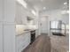 Modern kitchen boasts white cabinets, sleek countertops, and stainless steel appliances for a stylish cooking space at 5530 N 9Th St # 6, Tampa, FL 33604