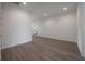 Bright and airy room with wood flooring and neutral paint at 5530 N 9Th St # 6, Tampa, FL 33604