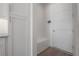 Clean mud room with a bench, storage cabinets, and modern design elements at 5530 N 9Th St # 6, Tampa, FL 33604