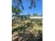 Spacious backyard with ample green space, perfect for outdoor activities and enjoying the serene surroundings of the property at 5680 24Th N Ave, St Petersburg, FL 33710