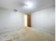Bedroom with neutral walls and open closet at 5720 Half Moon Lake Rd, Tampa, FL 33625