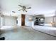 Open living area flows into kitchen, featuring updated appliances and ample counter space at 5720 Half Moon Lake Rd, Tampa, FL 33625