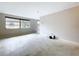 Spacious living room features a large window at 5720 Half Moon Lake Rd, Tampa, FL 33625