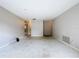 Bright living room with neutral walls and an open floor plan at 5720 Half Moon Lake Rd, Tampa, FL 33625