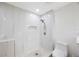 Beautiful bathroom with a tile shower and a modern toilet at 5933 Carina Trce, Wesley Chapel, FL 33545