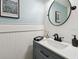 Charming bathroom features a modern sink, stylish decor, and soothing light blue walls at 6109 Bayside Key Dr, Tampa, FL 33615