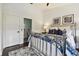 The bedroom features a metal bed frame and access to the bathroom at 6109 Bayside Key Dr, Tampa, FL 33615