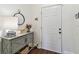 Foyer featuring a stylish gray console table with decorative accents at 6109 Bayside Key Dr, Tampa, FL 33615