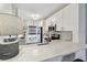 Modern kitchen with quartz countertops, stainless steel appliances, and ample storage at 6109 Bayside Key Dr, Tampa, FL 33615