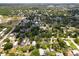 Aerial view of neighborhood shows house locations among lush trees at 6489 30Th N St, St Petersburg, FL 33702