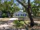 Inviting single-story home with mature trees shading the landscaped front yard at 6489 30Th N St, St Petersburg, FL 33702