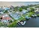 Stunning aerial view of a waterfront neighborhood with canals and a lush landscape at 6611 Surfside Blvd, Apollo Beach, FL 33572