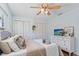 Bedroom with decor and flat screen TV at 6611 Surfside Blvd, Apollo Beach, FL 33572