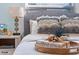 Bedroom with decorative pillows and books atop the bed at 6611 Surfside Blvd, Apollo Beach, FL 33572