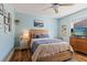 Comfortable bedroom with light walls and wood-look floors at 6611 Surfside Blvd, Apollo Beach, FL 33572