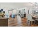 Open-concept living room and dining area with hardwood floors and plenty of natural light at 6611 Surfside Blvd, Apollo Beach, FL 33572