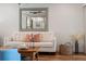 Comfortable living room featuring wood floors, plush seating, and stylish decor, creating a relaxing atmosphere at 6611 Surfside Blvd, Apollo Beach, FL 33572