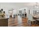 Open-concept living room and dining area with hardwood floors and plenty of natural light at 6611 Surfside Blvd, Apollo Beach, FL 33572