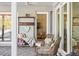 Covered patio with outdoor seating and views of the backyard pool at 6611 Surfside Blvd, Apollo Beach, FL 33572