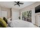 Serene bedroom with closet, balcony access, and soft natural light, creating a relaxing atmosphere at 6627 Date Palm S Ave, St Petersburg, FL 33707