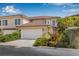 Beautiful two-story home with a two-car garage and lush landscaping at 6627 Date Palm S Ave, St Petersburg, FL 33707