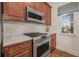 Modern kitchen featuring stainless steel appliances, sleek countertops, and custom cabinetry at 6627 Date Palm S Ave, St Petersburg, FL 33707