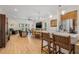 Spacious living area flows into the kitchen, offering a comfortable seating area and abundant natural light at 6627 Date Palm S Ave, St Petersburg, FL 33707