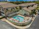 Inviting community pool area perfect for relaxation and socializing in a lovely setting at 6627 Date Palm S Ave, St Petersburg, FL 33707
