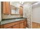 Bathroom vanity with granite countertops and ample storage space at 701 Poinsettia Rd # 340, Belleair, FL 33756