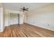 Bright bedroom featuring laminate flooring and a closet, offering a simple design at 701 Poinsettia Rd # 340, Belleair, FL 33756