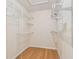 Walk-in closet equipped with wire shelving, providing ample storage space at 701 Poinsettia Rd # 340, Belleair, FL 33756