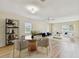 Bright and spacious living room with modern decor, hardwood floors, and lots of natural light at 701 Poinsettia Rd # 340, Belleair, FL 33756