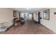 Inviting condominium lobby area with comfortable seating, tiled floors, and convenient access for residents at 701 Poinsettia Rd # 340, Belleair, FL 33756