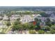 Aerial image showing property close to commercial businesses and residential homes near local roads at 717 E 137Th Ave, Tampa, FL 33613