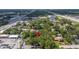 Overhead image of land in a neighborhood close to a four-lane road and local business at 717 E 137Th Ave, Tampa, FL 33613