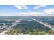A high altitude image showcasing highways, trees, commercial and residential areas in the distance at 717 E 137Th Ave, Tampa, FL 33613