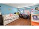 Multi-purpose bonus room provides ample space for relaxation and play area with laminate flooring at 717 E 137Th Ave, Tampa, FL 33613